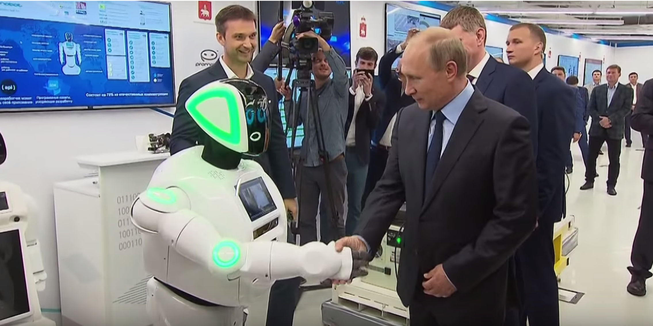 vladimir putin shakes hand with promobot robot
