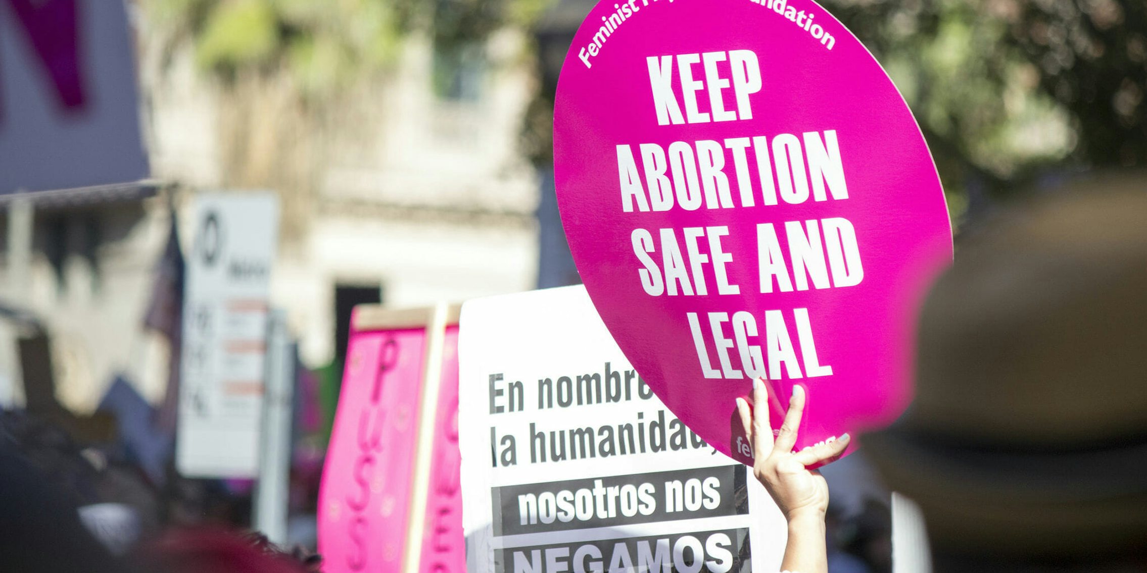 Safe and legal abortion signs at the Women's March in Los Angeles
