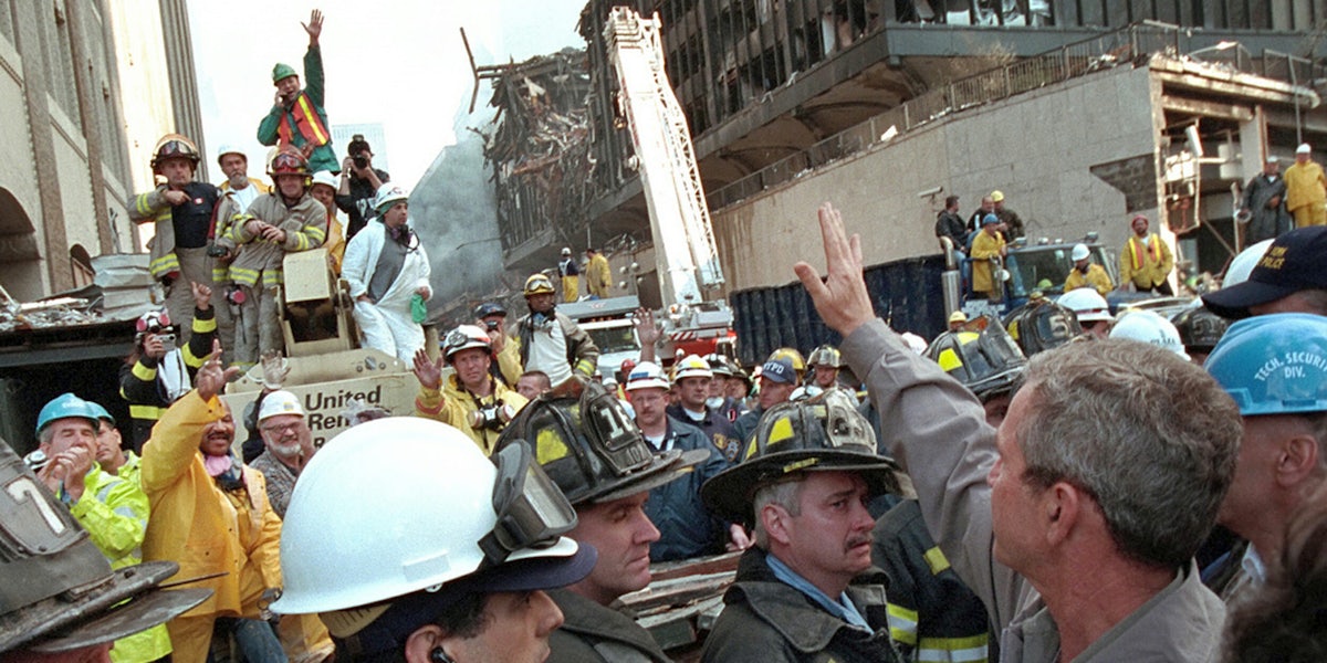Former President George W. Bush visits Ground Zero.