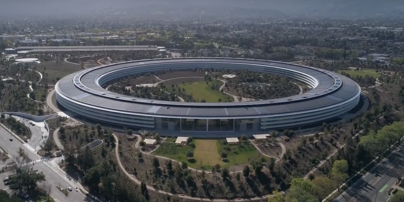 Apple Park drone view of glass walls