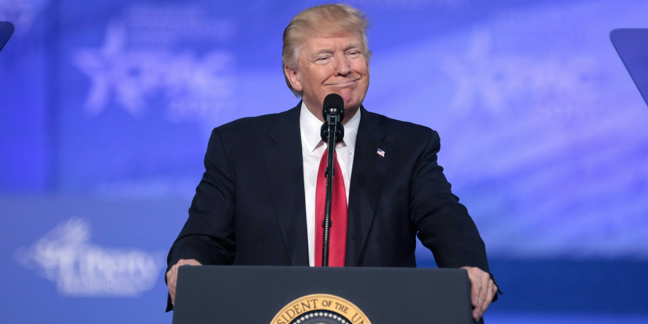 Donald Trump smiling at CPAC 2017