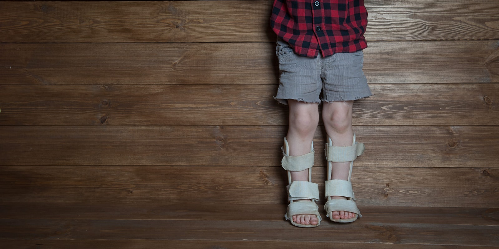 Child with Leg Braces