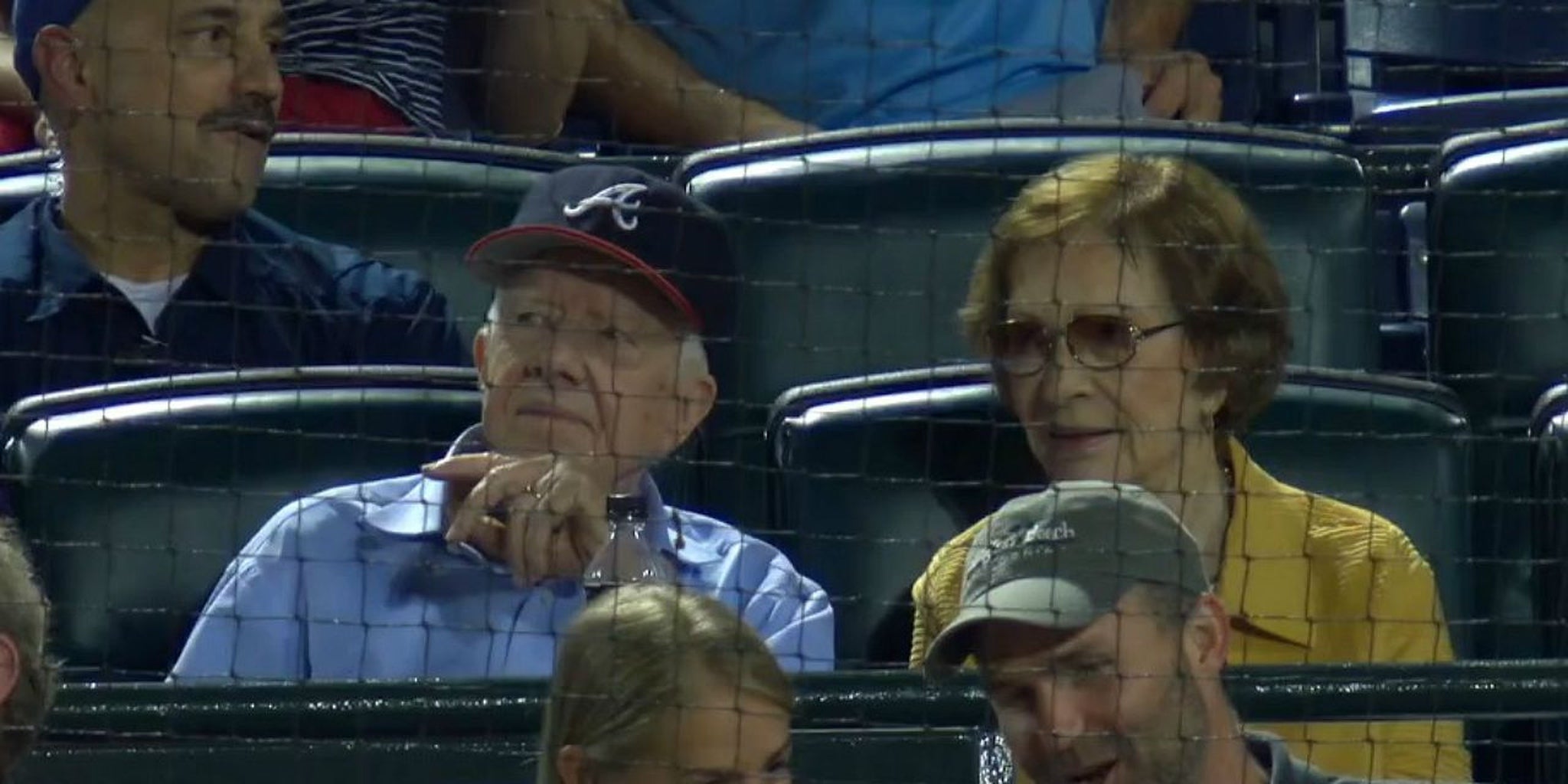 President Jimmy Carter plants a smooch on his wife during Kiss Cam(01)