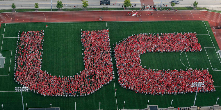 University of Cincinnati composite photo of students forming the school's initials