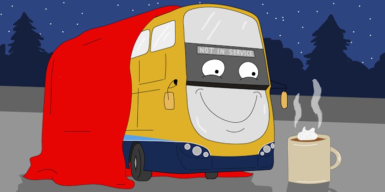 Cartoon depicting a Dublin bus with a blanket and hot coco