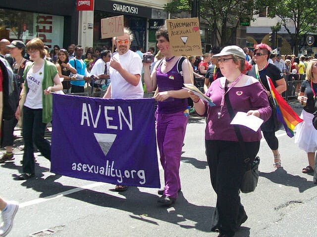 Asexual activists march for LGBTQ rights.