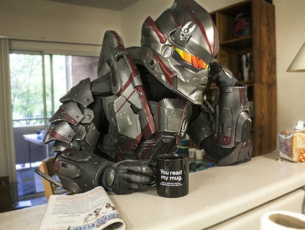 A Spartan super-soldier from Halo, dressed in Hayabusa-style armor, having his morning coffee. Armor via Impact Props.