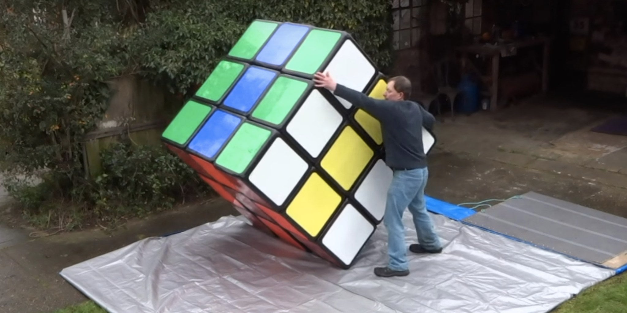 Solving this giant Rubik's Cube looks like an intense workout The