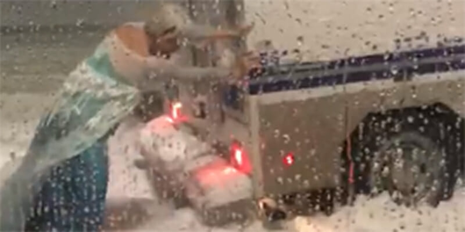 A drag queen dressed as Elsa saved a police van from snow in Boston.
