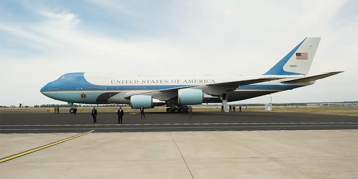 Air Force One on runway with Secret Service agents