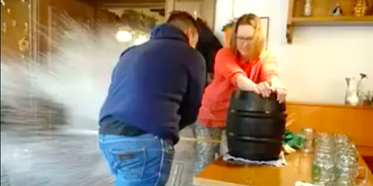 german keg tapping fail: video shows man trying and failing to tap a keg