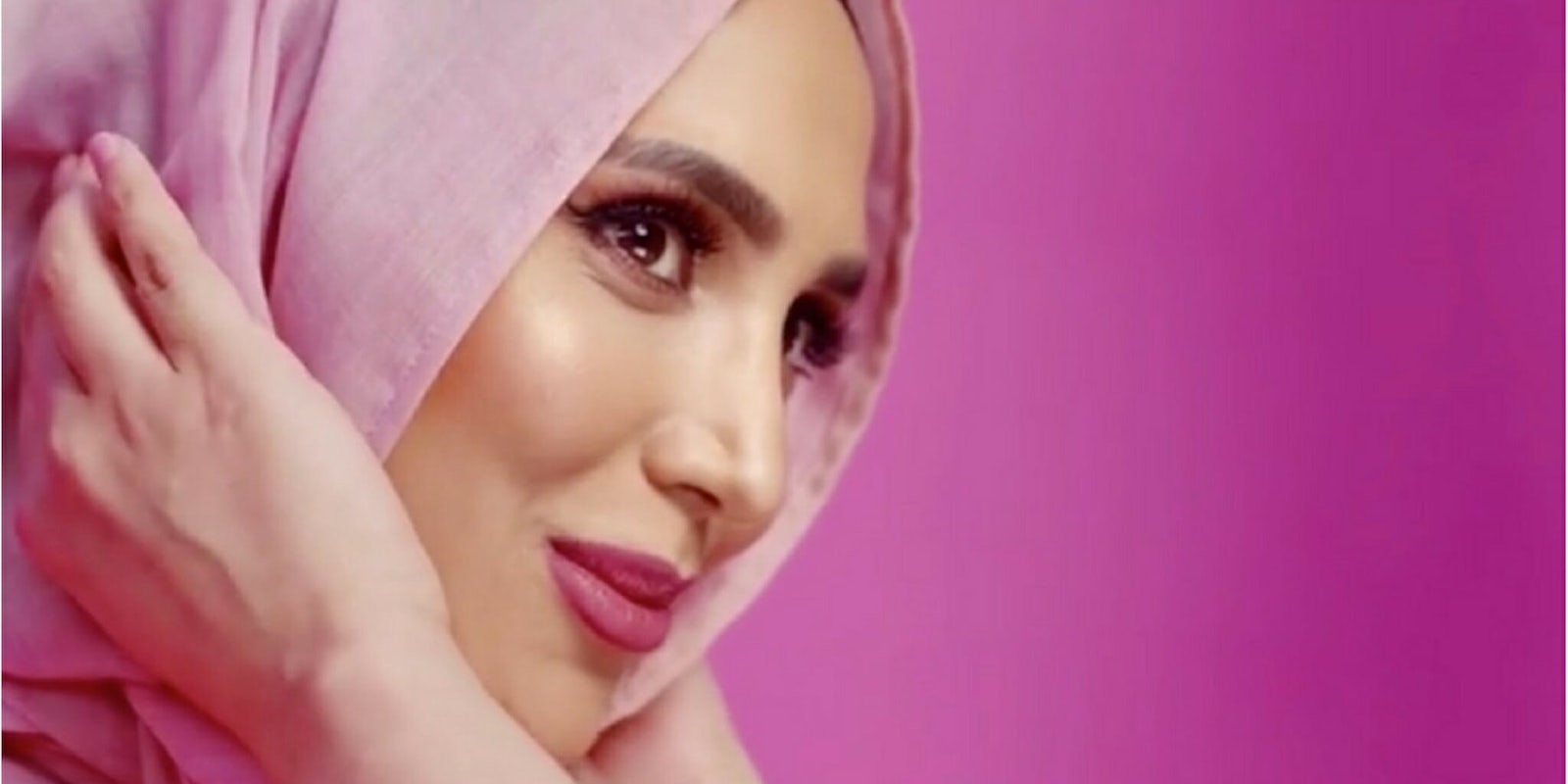 Amena Khan wears a hijab for a L'Oreal Paris haircare campaign.