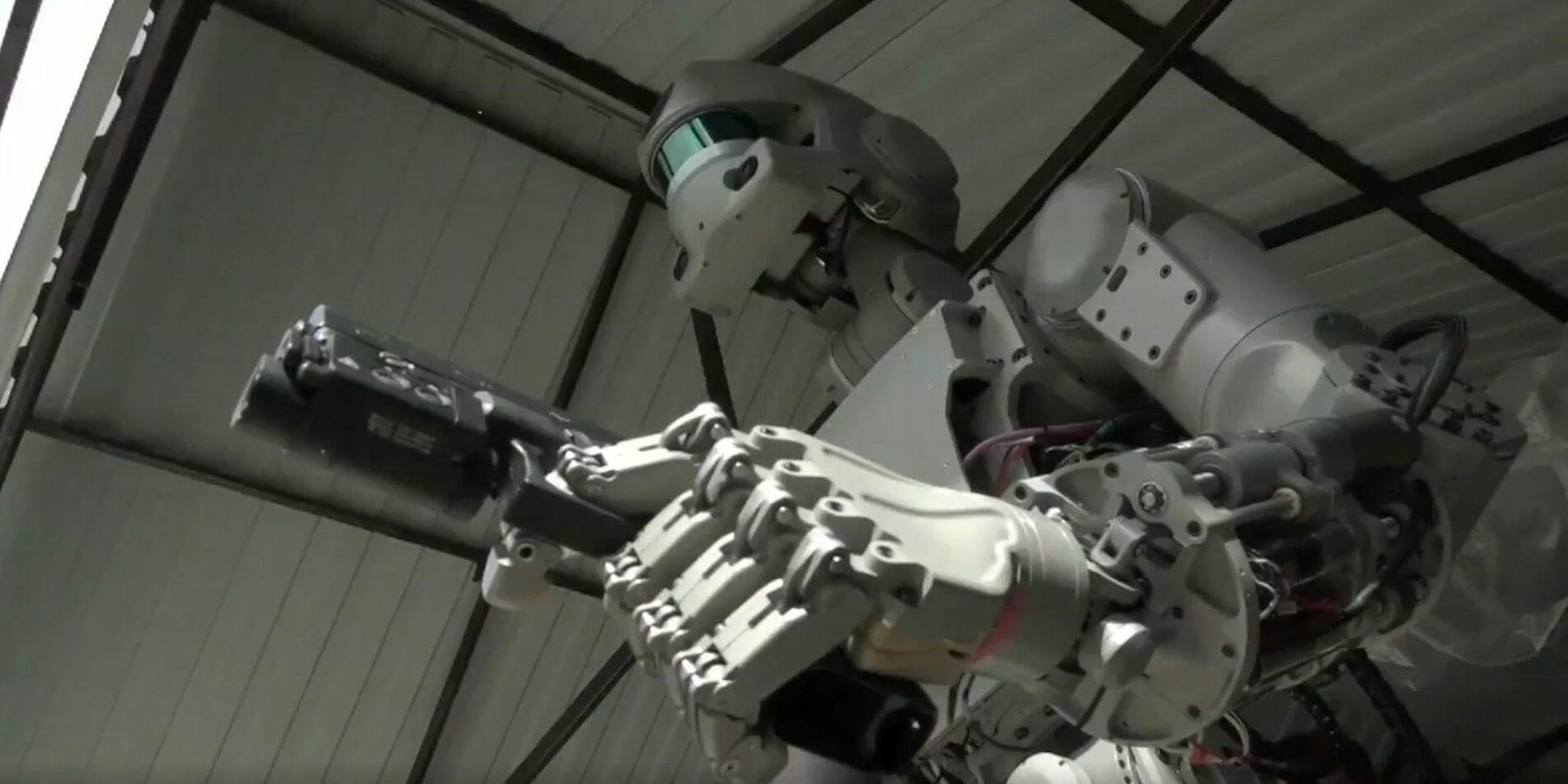 russian robots dual wielding guns space