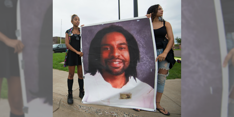 Two women protest Philando Castile's officer-involved shooting death