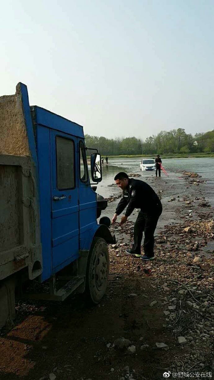 car in river police china