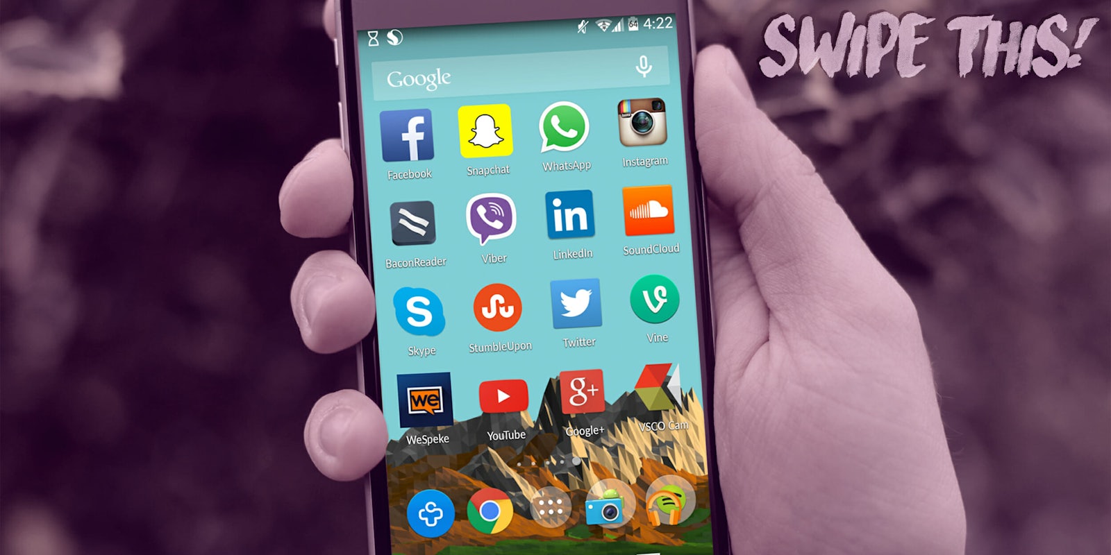 Hand holding phone with social media app icons
