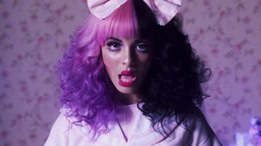 Melanie Martinez in her music video for her song 'Dollhouse.'