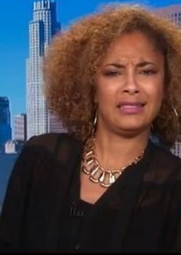 Amanda Seales contorting her mouth