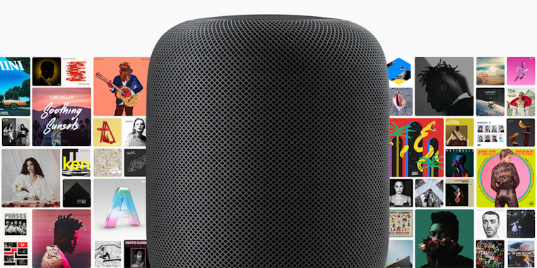 Black HomePod with album covers behind