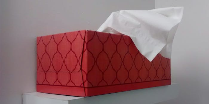 Red tissue box on shelf