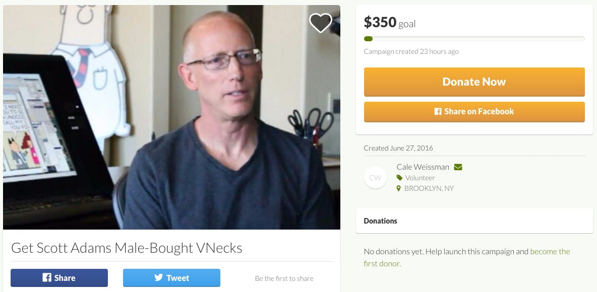 Scott Adams in a v-neck sweater, presumably purchased by himself or a fellow man.