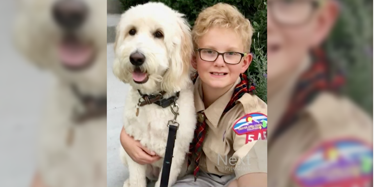 Colorado-based Cub Scout Ames Mayfield and his dog