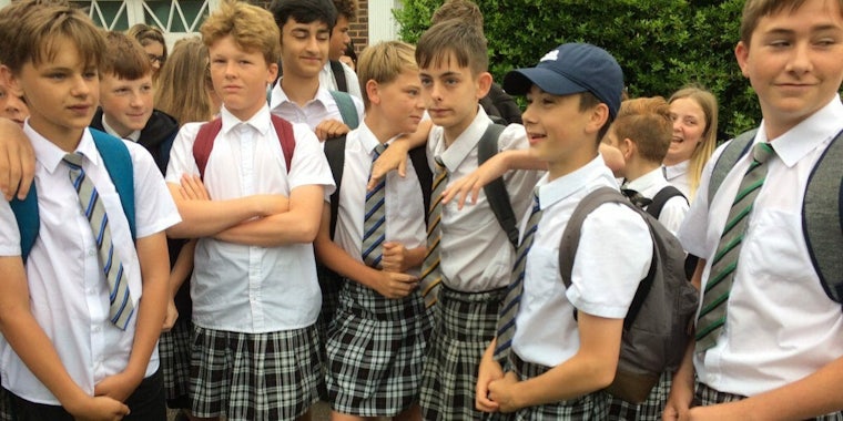 Isca Academy boys in skirts