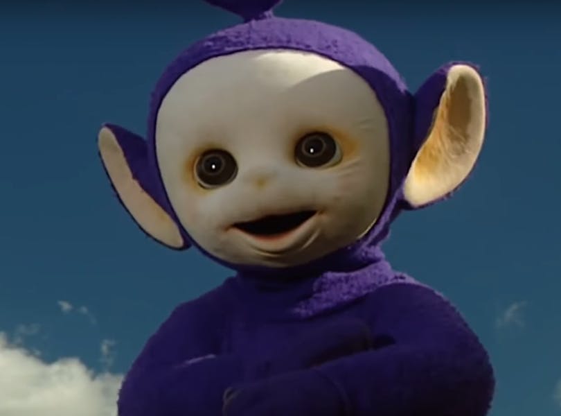 Tinky Winky looks into camera