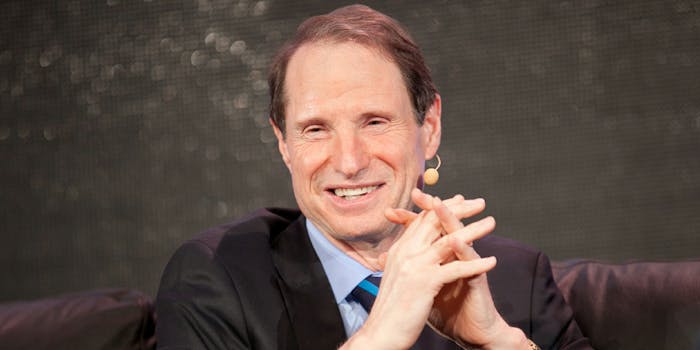 Ron Wyden smiling on couch
