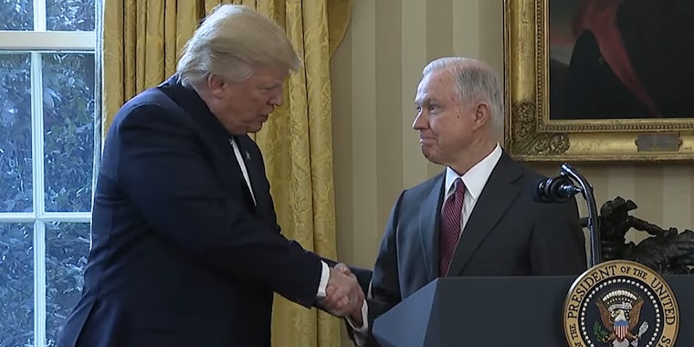 Donald Trump and Jeff Sessions shaking hands at swearing-in ceremony