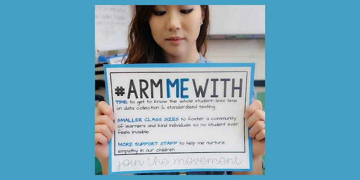 Teacher holding sign with #ArmMeWith "Time, Smaller Class Sizes, More Support Staff" sign