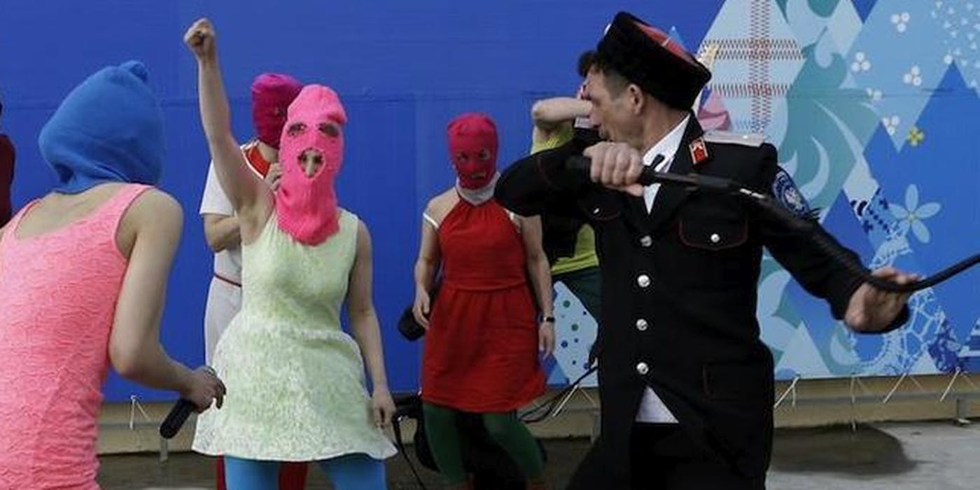 Members Of Pussy Riot Whipped By Russian Cossacks In Sochi