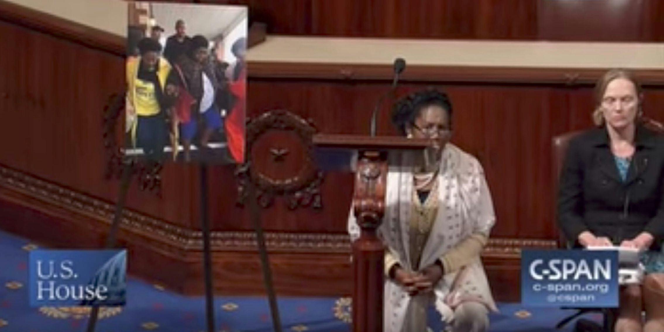 Rep. Sheila Jackson Lee kneels