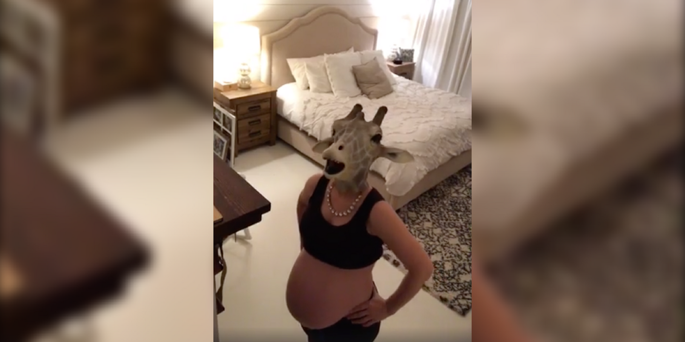 'April the Giraffe' emulator Erin Dietrich walks around her bedroom in a giraffe mask
