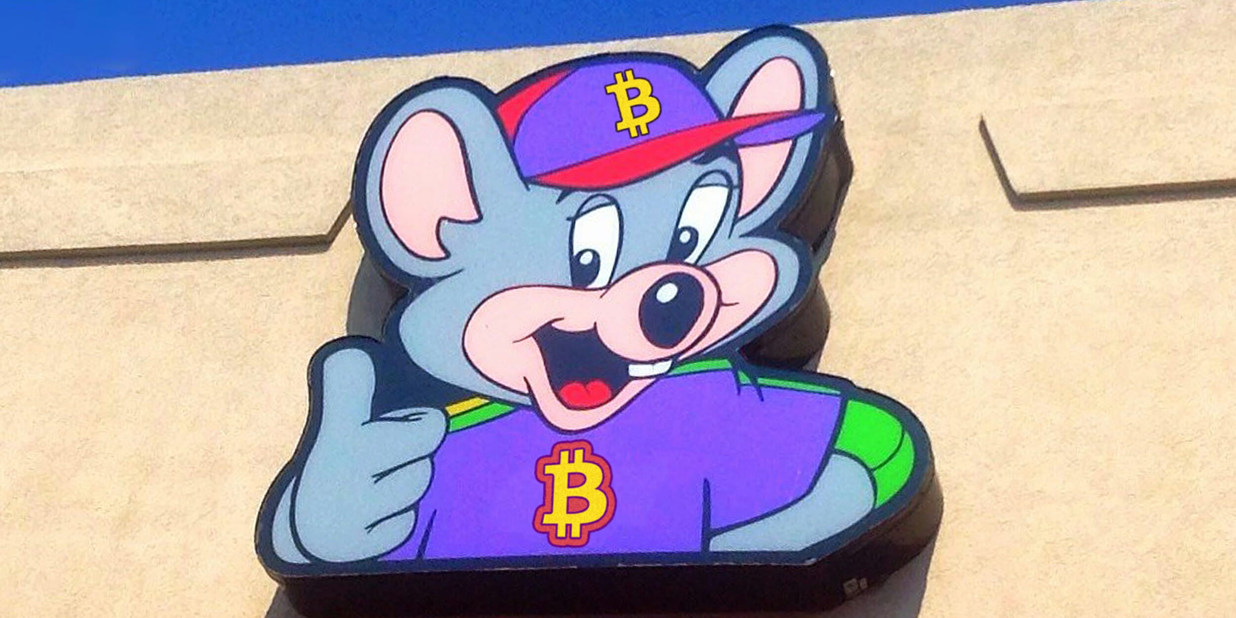 Chuck E Cheese with Bitcoin logo