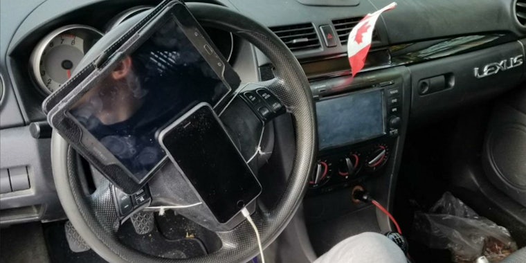 apple iphone galaxy tablet on steering wheel