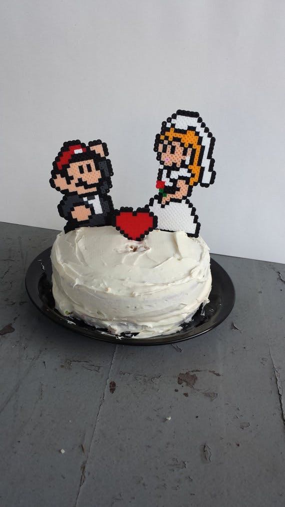 15 wonderfully nerdy wedding cake toppers - Daily Dot