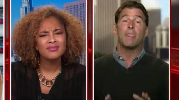Amanda Seales scrunching up her face in disgust