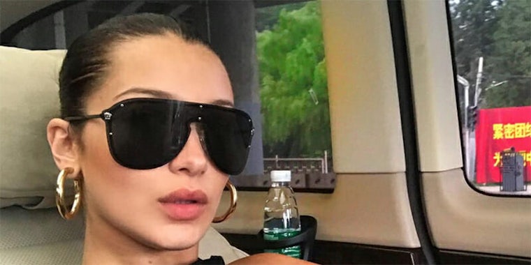 People speculated about whether Bella Hadid intentionally included a political Chinese banner in an Instagram selfie.