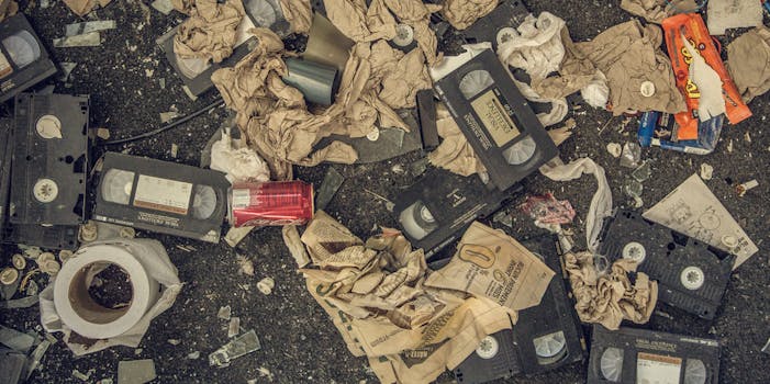 VHS tapes mixed with trash on the ground