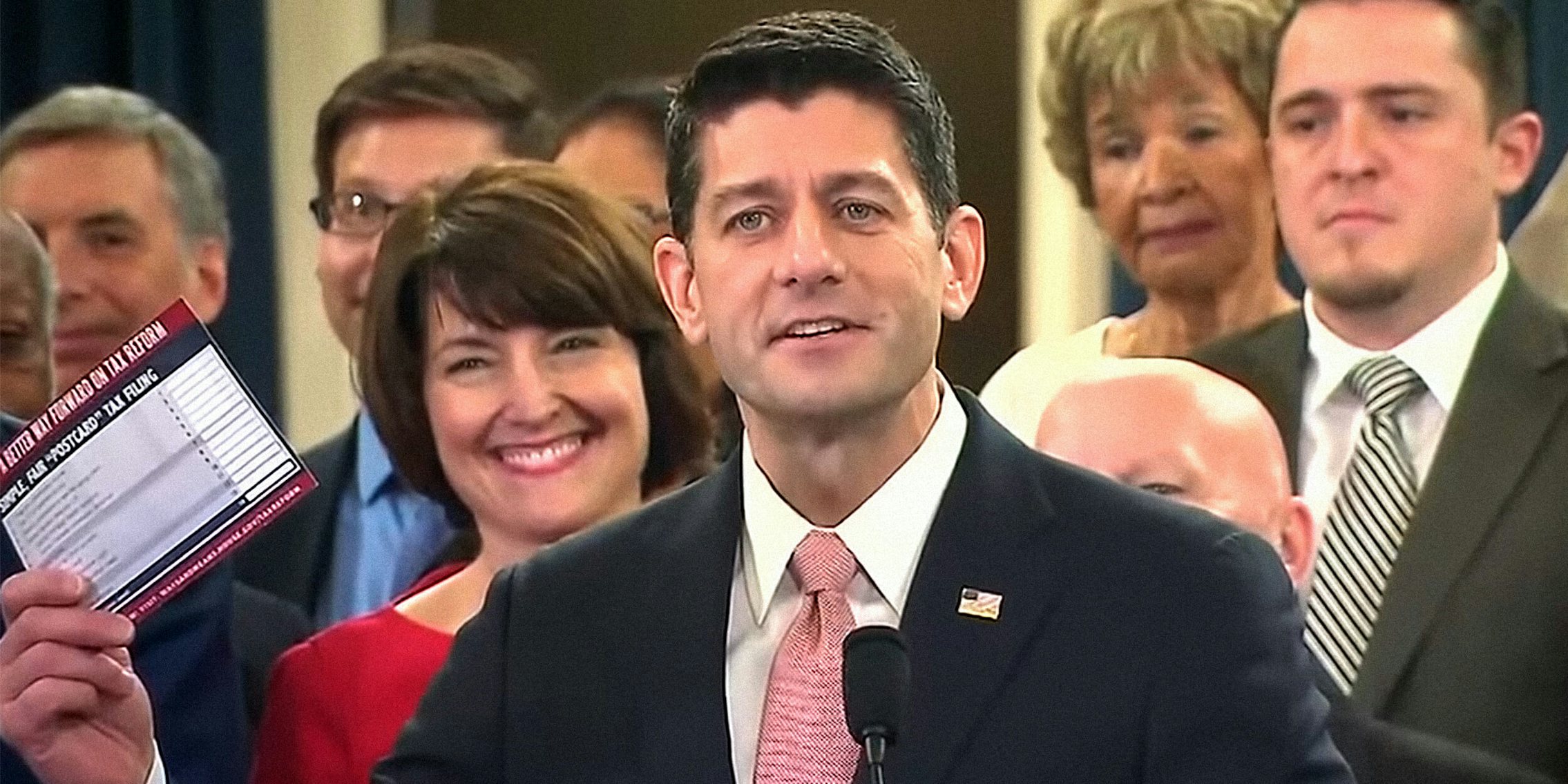 Paul Ryan holding up tax plan 'postcard'
