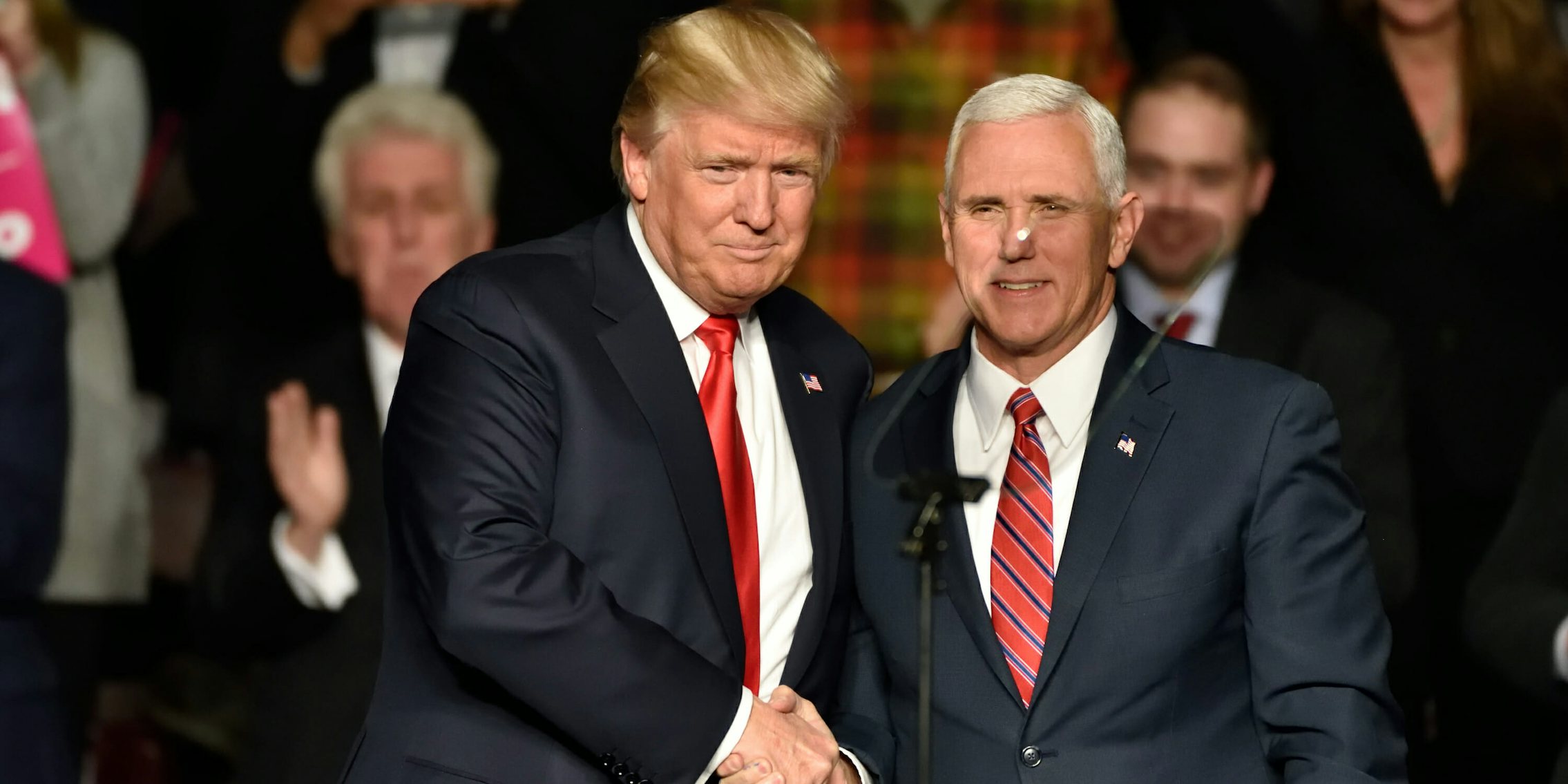 Donald Trump and Mike Pence Shaking Hands at a Rally