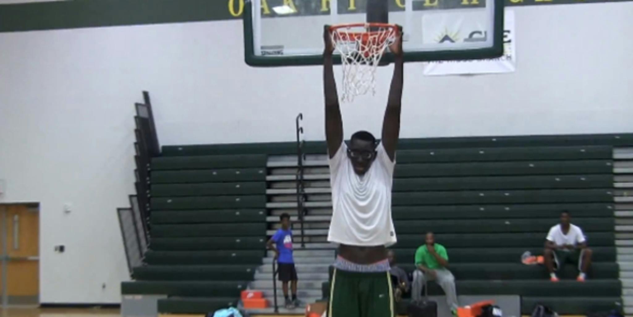 Watch the country's tallest high school basketball player in action