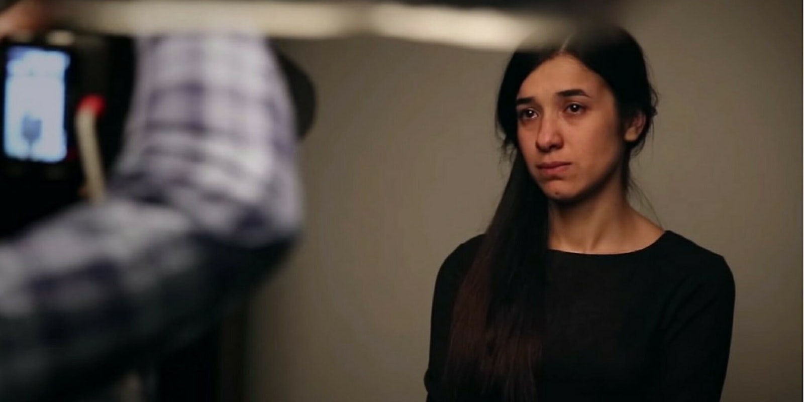 Nadia Murad, a survivor of genocide against the Yazidi people, being photographed.
