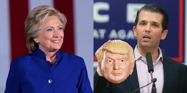 Hillary Clinton with Donald Trump Jr holding a Trump mask