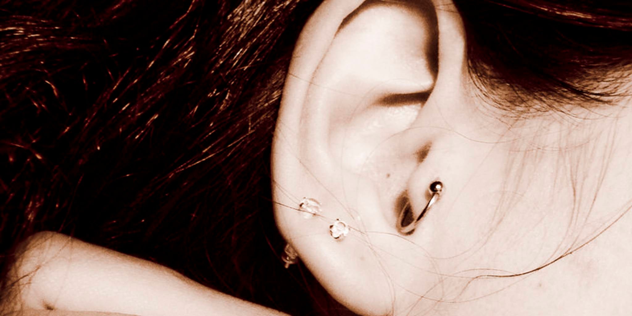 Does a Tragus Piercing Hurt? What to Know About Pain, Cost, and Healing