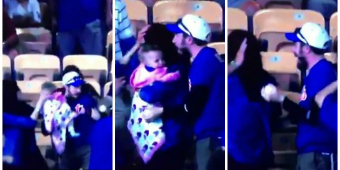 Catching a Foul Baby While Holding a Baby Has Never Looked So Easy