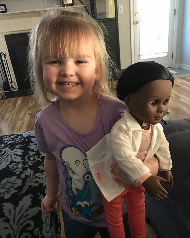 2-year-old Sophia and her new doll.