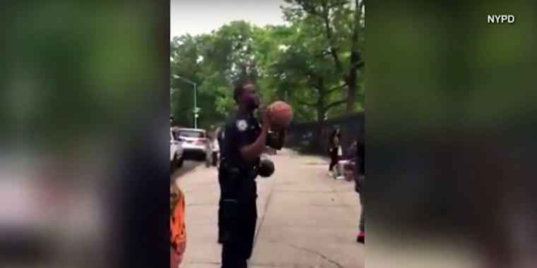 nypd cop basketball shot