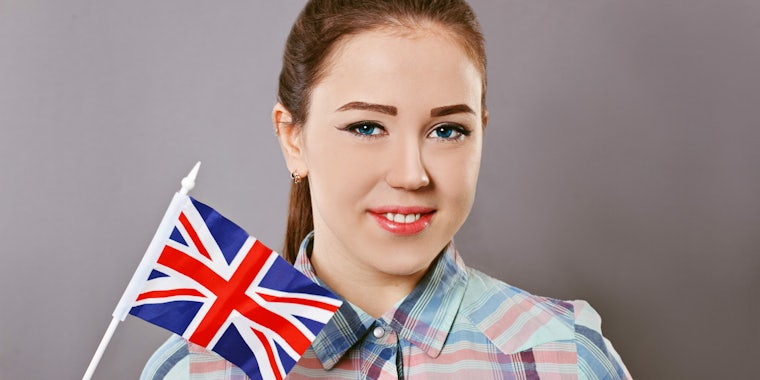 Woman holding the UK flag